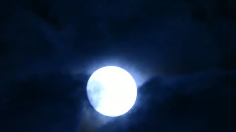 Full moon with clouds drifting past Stock Footage 10812587