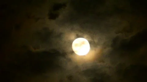 Full moon with clouds drifting past Stock Footage 10812784