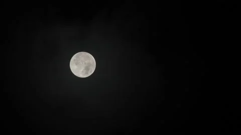 Full Moon with Clouds moving over it - Penumbral Lunar Eclipse 11-08-2022 Video stock 222706164