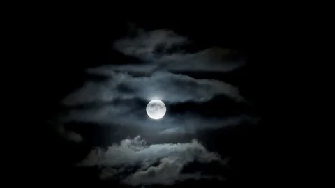 Full moon clouds night sky Stock Footage