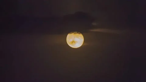 Full moon in the clouds in the night sky Stock Footage 151425002
