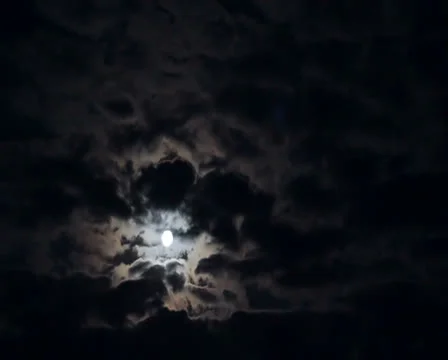 Full moon in clouds at night timelapse Stock Footage 24948034