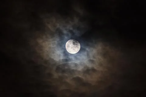 Full moon in the clouds Stock Photos