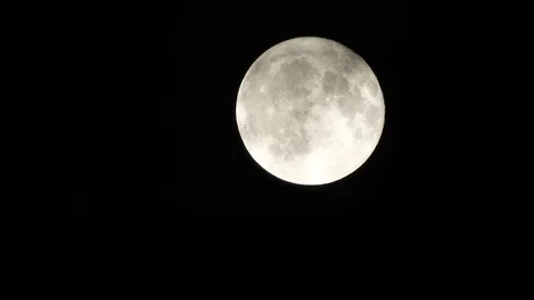 Full Moon in cloudy night sky. Close up  4k video Stock Footage 95645533