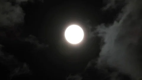 Full Moon in cloudy night sky. Close up  4k video Stock Footage 95645543