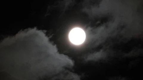 Full Moon in cloudy night sky. Close up  4k video Stock Footage 95646048
