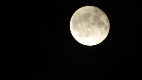 Full Moon in cloudy night sky. Close up  4k video Stock Footage 95646346