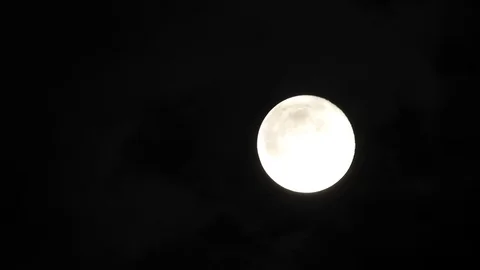 Full Moon in cloudy night sky. Close up  4k video Stock Footage 95646412