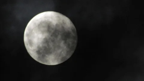 Full Moon in cloudy night sky. Close up  4k video Stock Footage 95647037