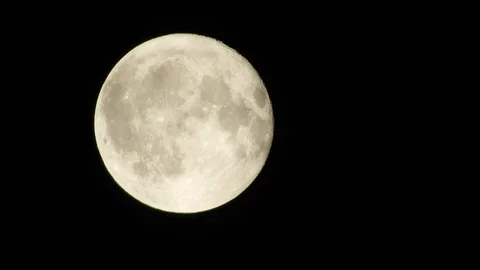 Full Moon in cloudy night sky. Close up  4k video Stock Footage 95647064