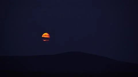 Full moon coming out of the clouds Stock Footage 148679185
