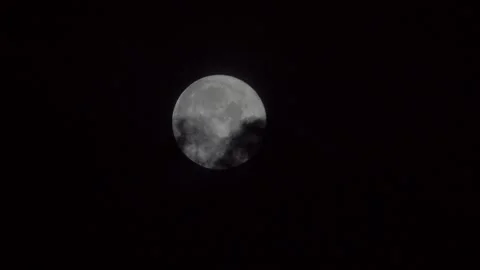 The full moon is covered with black clouds Stock Footage 166083487