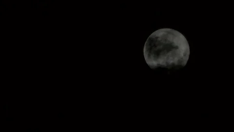 The full moon is covered with black clouds Stock Footage 166084157