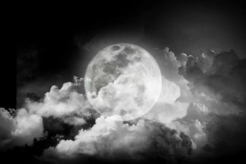 Full moon covered with clouds. Stock Photos