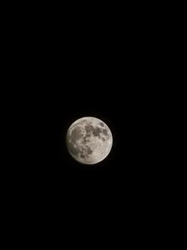 Full moon with dark clouds in the night sky Stock Photos