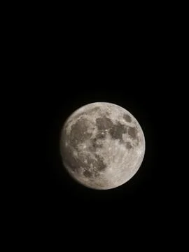 Full moon with dark clouds in the night sky Stock Photos