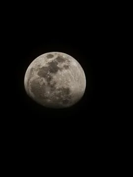 Full moon with dark clouds in the night sky Stock Photos