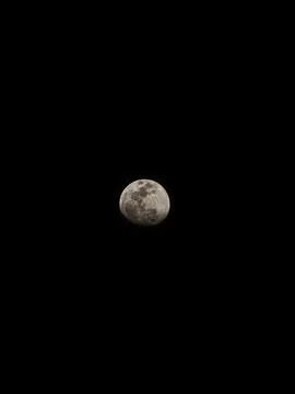 Full moon with dark clouds in the night sky Stock Photos