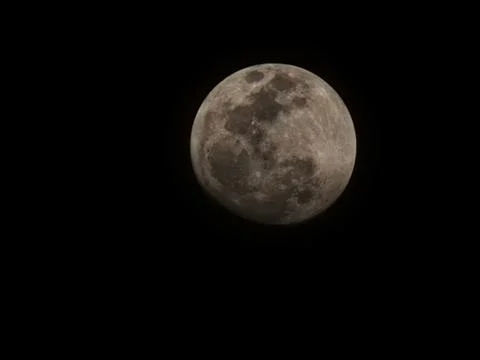 Full moon with dark clouds in the night sky Stock Photos