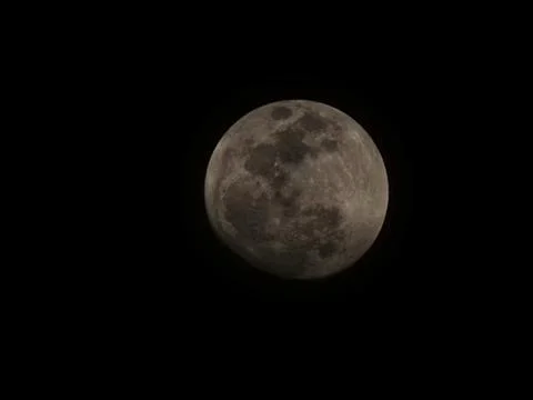 Full moon with dark clouds in the night sky Stock Photos