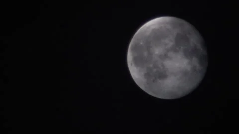 Full moon on the dark cloudy night, close-up. No sound. Stock Footage 92367637