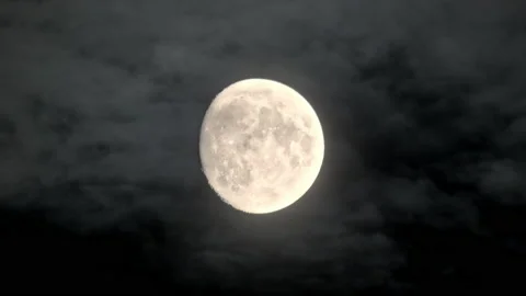 Full moon on dark cloudy night. Close up shot on Telephoto lens Stock Footage 180378539