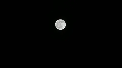 Full moon in dark night behind the clouds. Video stock 18194407