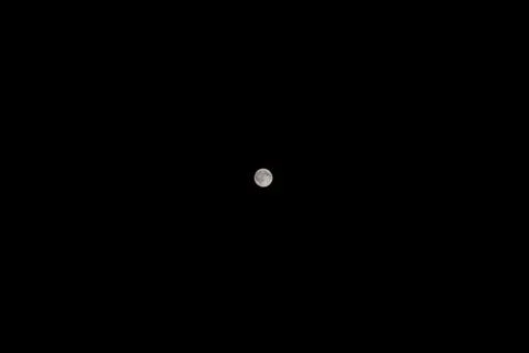 Full moon on dark night sky background Stock Photos