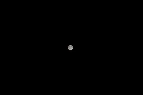 Full moon on dark night sky background Stock Photos
