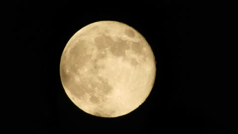 Full moon in a dark sky close up Stock Footage 134979219