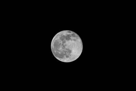 Full moon on dark sky Stock Photos