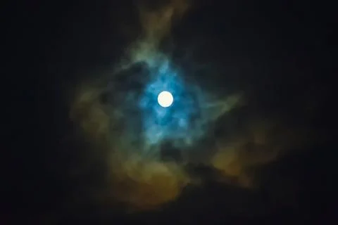Full moon on dramatic cloudy sky Stock Photos