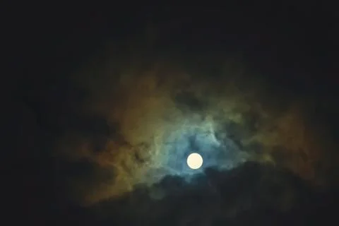 Full moon on dramatic cloudy sky Stock Photos