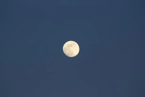 Full moon in the evening on sky Stock Photos
