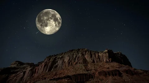 Full moon flying over a mountain at night Stock Footage 113047200