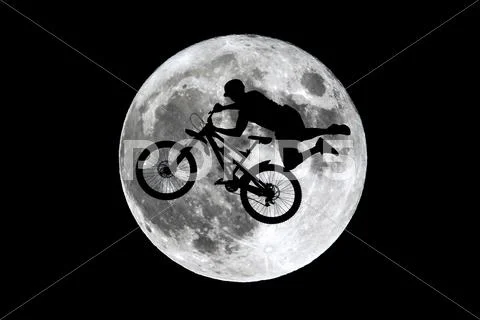 Full moon free rider jumping Stock Photos