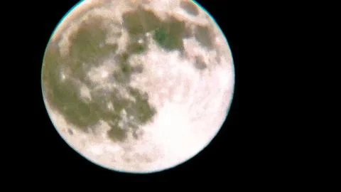 Full moon glowing bright in dark night sky creating mysterious celestial at.. Stock Photos