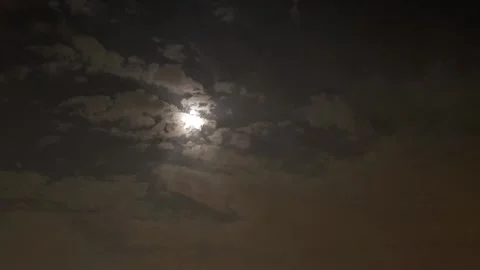 Full Moon Glowing Through Night Clouds Stock Footage 332134229