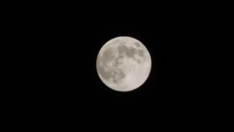 Full moon going across the frame Stock Footage 130147286