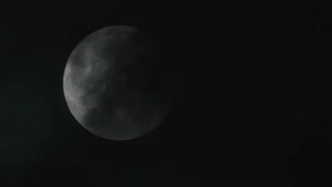 Full moon hiding behind the clouds Stock Footage 168769227
