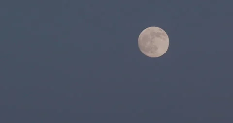 Full moon illuminated at twilight Stock Footage 332378218