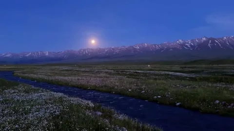 Full Moon Illuminates River and Snow-Capped Mountains in Tibet, China Vídeos de archivo 337273694