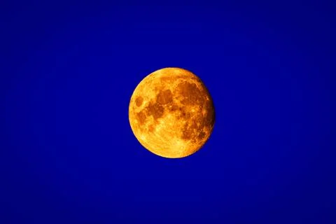 Full moon isolated on blue background. Close up Image. Stock Illustration