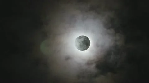 The full moon lay hidden behind the clouds. Video stock 22304916