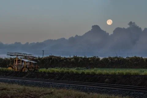 Full moon leading field workers to the task. Stock Photos
