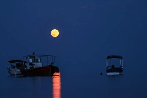 Full moon in Lichadonisia, Aidipsos, Greece - 26 Aug 2018 Stock Photos