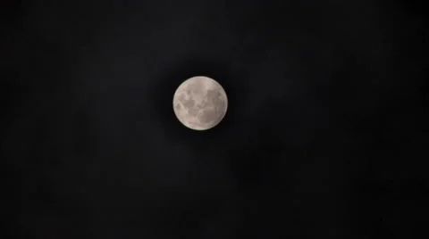 Full moon with light clouds Stock Footage 60964759