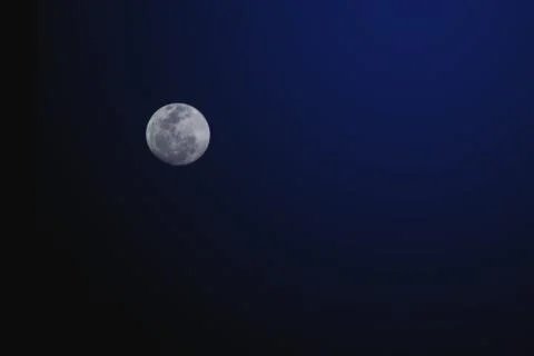 Full moon on midnight Stock Photos