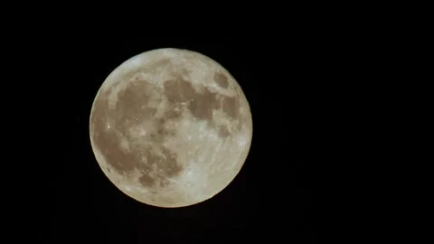 The full moon moves in the black sky. Time lapse. Macro photography Stock Footage 258328561