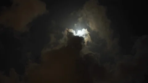 Full Moon Moves in the Night Sky through Dark Clouds.timelapse Stock Footage 92758924